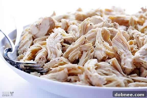 Easy Slow Cooker Shredded Chicken - A simple tutorial for how to make delicious, versatile shredded chicken in your slow cooker.