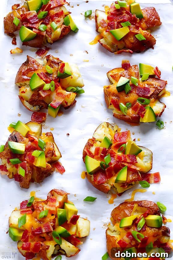 Final plated Loaded Smashed Red Potatoes with various toppings