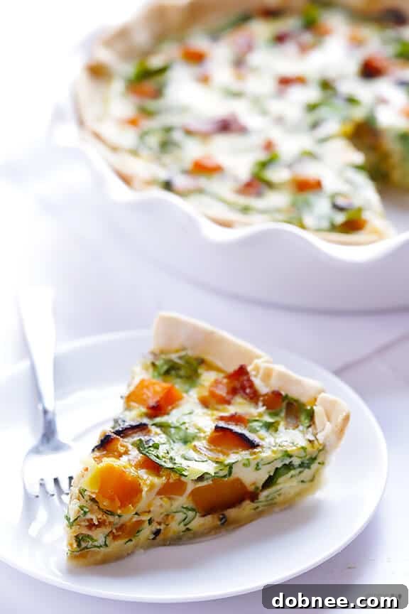 Close-up of golden Butternut Squash, Arugula, and Bacon Quiche, showing creamy filling