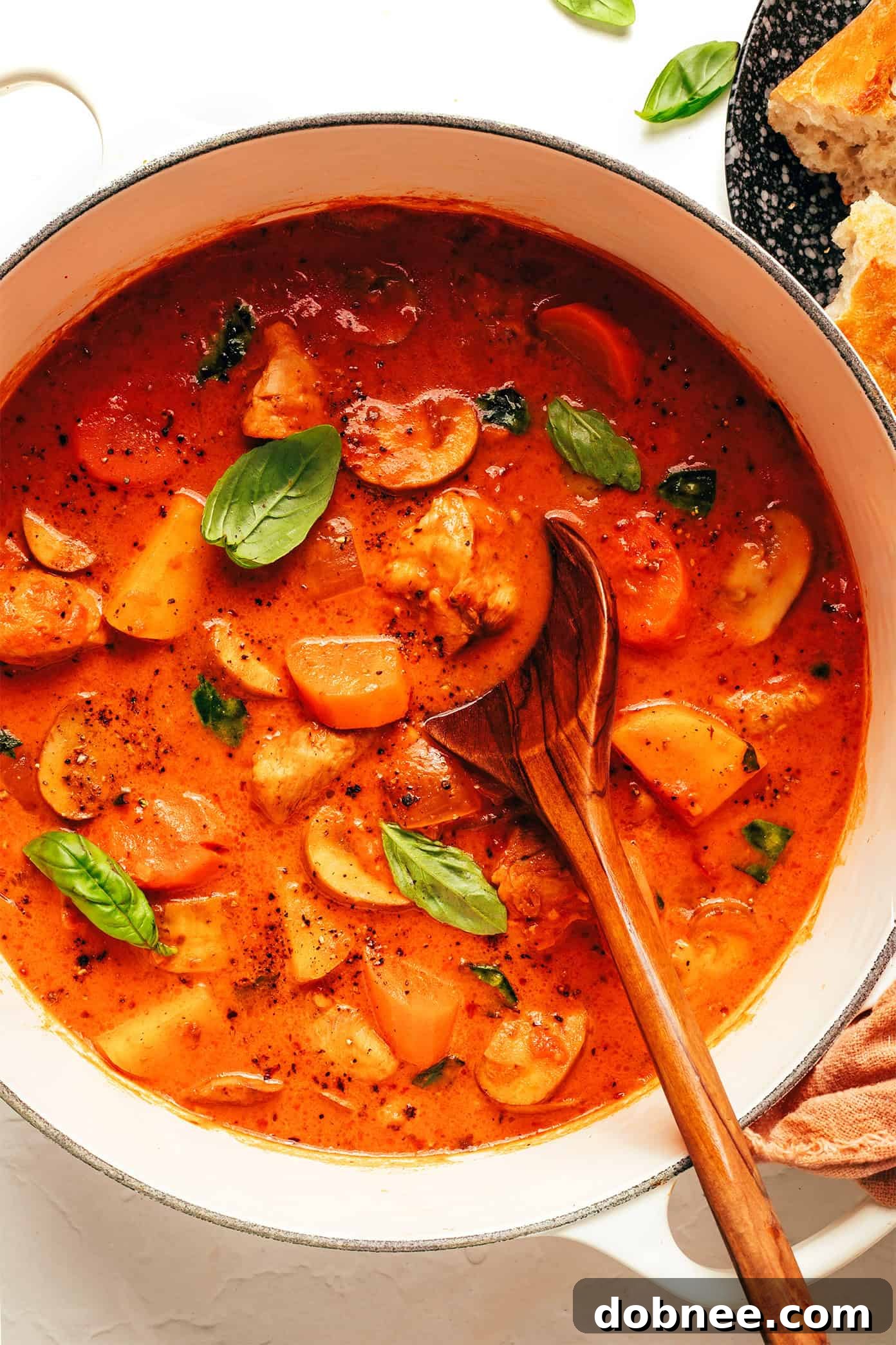 Mediterranean Chicken Tomato Basil Stew 2 Flavorful and hearty Tomato Basil Chicken Stew in a bowl