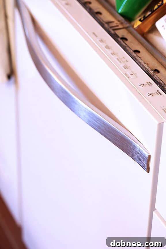 Close-up of sleek white kitchen appliances.