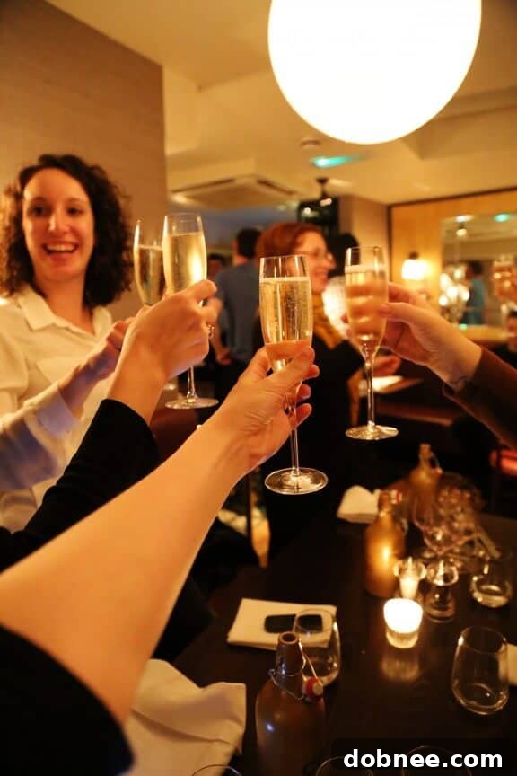 Friends enjoying a wine toast in Oxford, England, celebrating new year