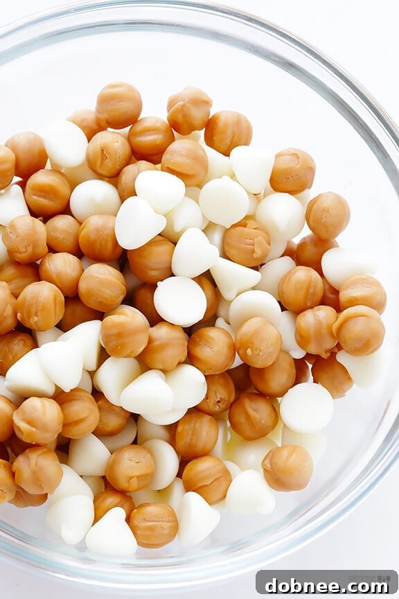 Close-up of a stack of Caramel White Chocolate Cookies with melted caramel