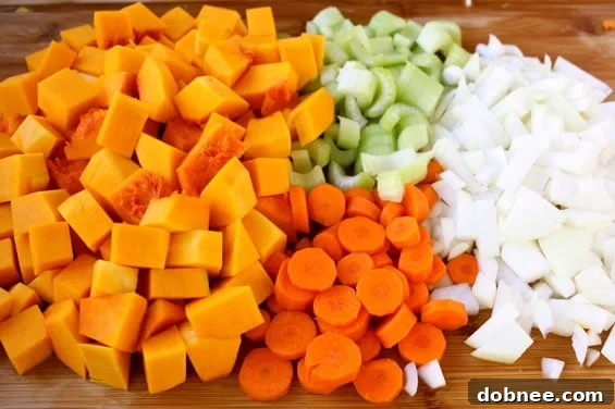 Butternut Squash and Crab Bisque: A close-up of a steaming bowl of gourmet soup, garnished for perfection.