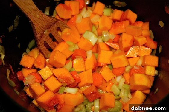 Butternut Squash and Crab Bisque: A beautifully styled bowl of soup, ready to be enjoyed.