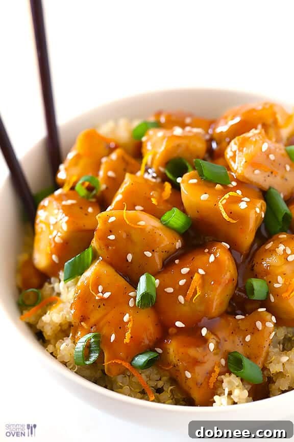 Close-up of freshly cooked Skinny Orange Chicken, showcasing its rich, glossy sauce and tender chicken pieces.