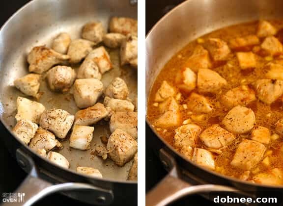 Bite-sized chicken pieces sautéing in olive oil in a pan, browning nicely.