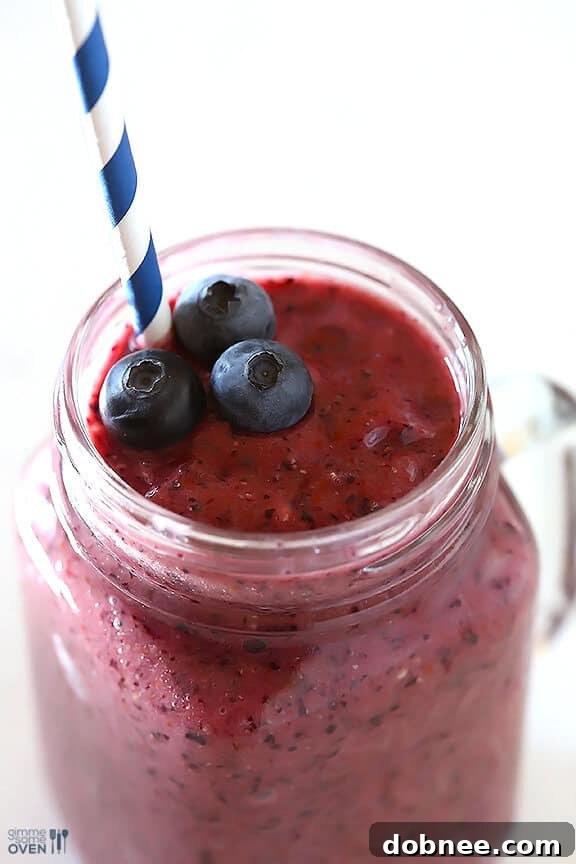 A refreshing glass of the Blueberry Avocado Brain Power Smoothie, perfect for a healthy start to your day or an afternoon pick-me-up.
