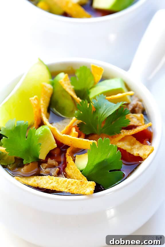 Close-up of Skinny Slow Cooker Taco Soup in a serving bowl