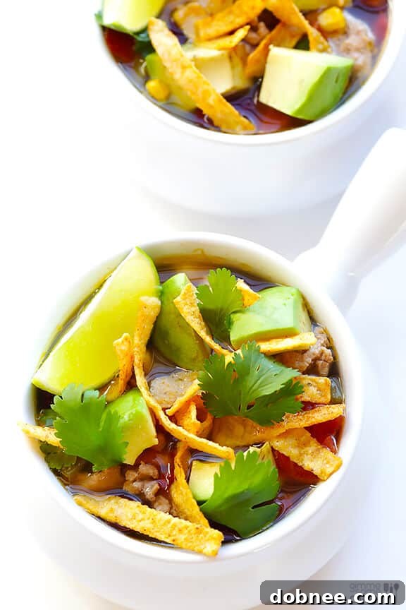 Overhead shot of a full bowl of Skinny Slow Cooker Taco Soup