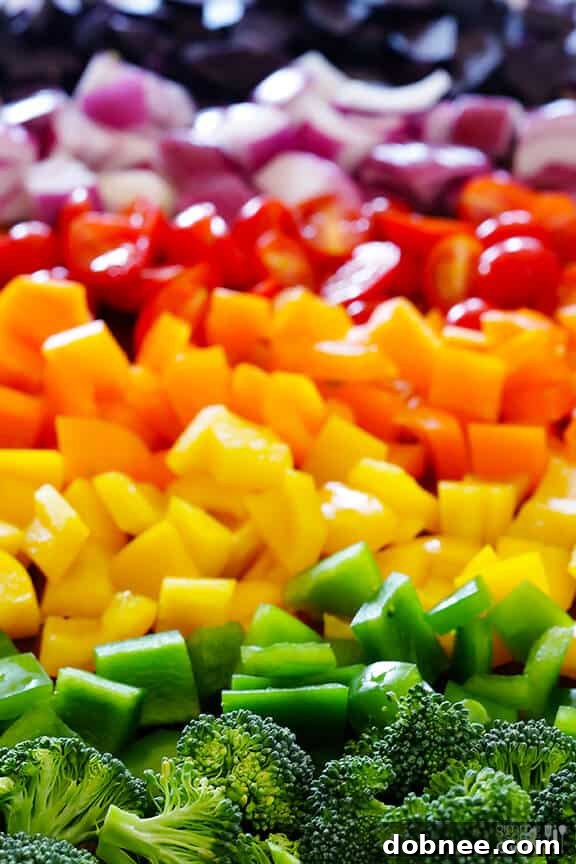 Preparation steps for Rainbow Veggie Flatbread Pizza: chopped vegetables
