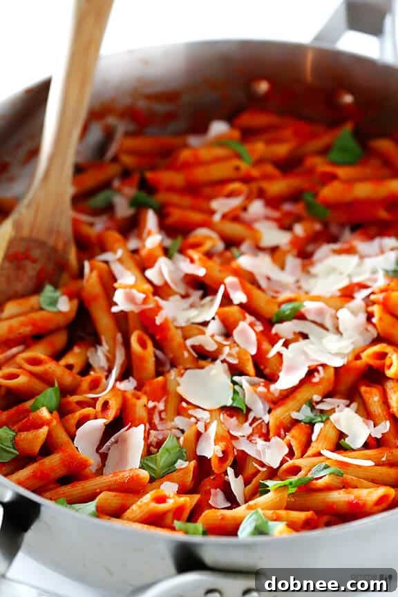 Pasta with Parmesan and Basil Garnished Pasta with Roasted Red Pepper Sauce