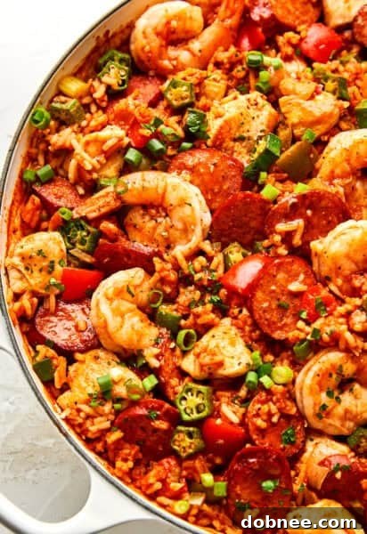 A vibrant and hearty pot of Jambalaya with chicken, shrimp, and sausage.