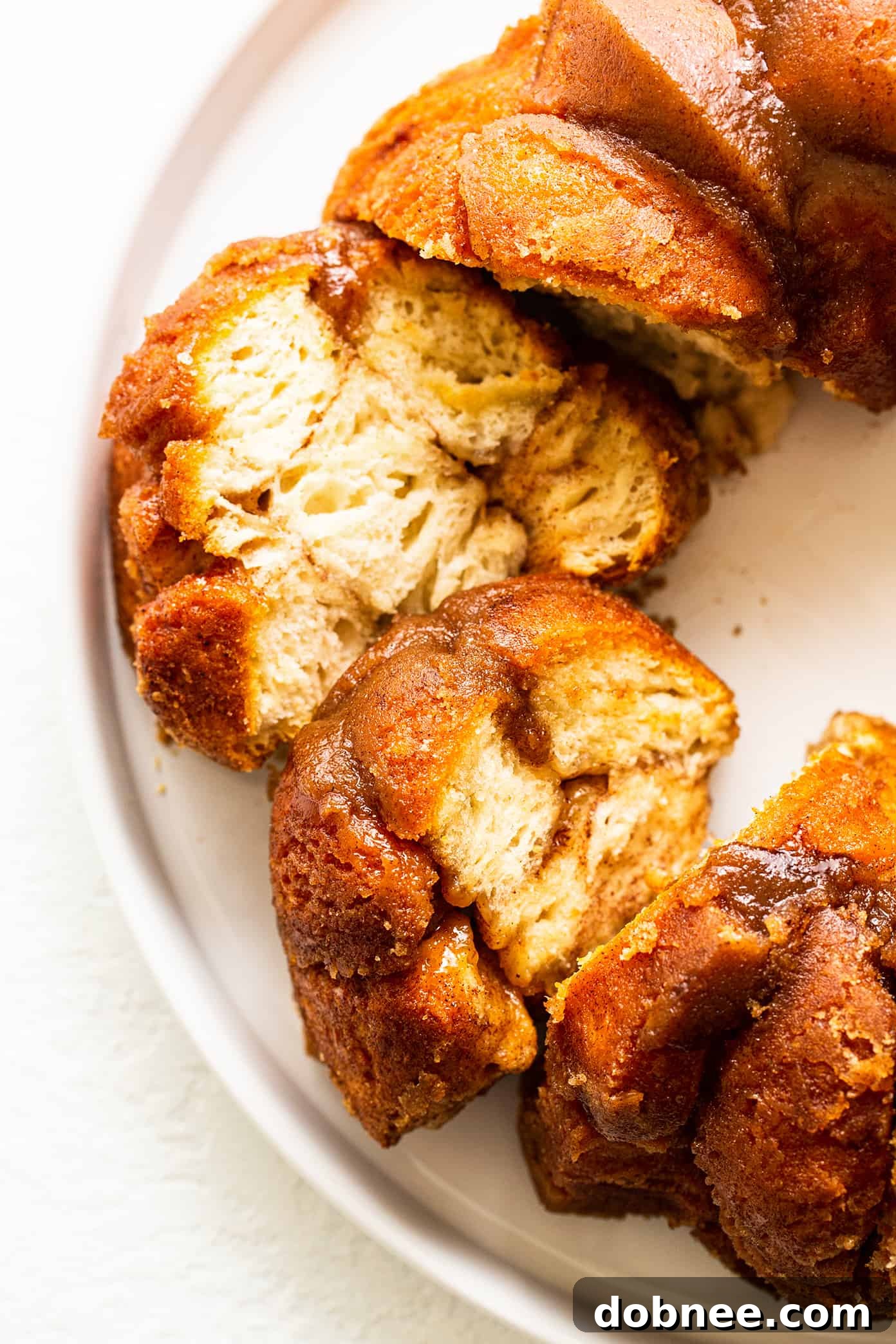 Classic Monkey Bread fresh out of the oven, golden brown and glistening with caramel sauce