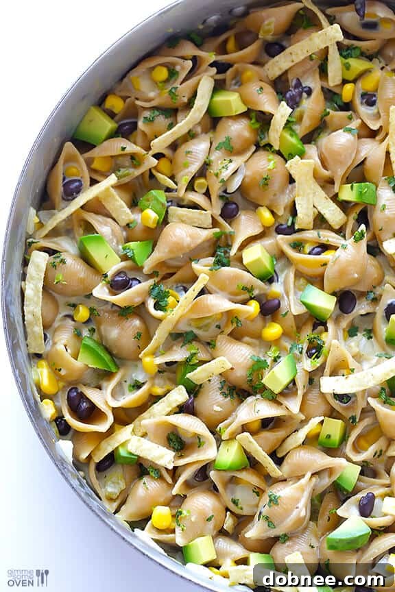 Mexican Macaroni and Cheese topped with fresh avocado