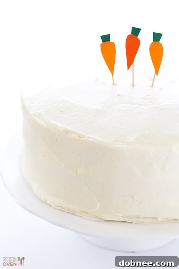 The initially simple decorated Vegan Gluten-Free Carrot Cake, elegant and inviting.