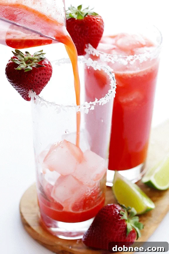 Smooth, blended fresh strawberry margarita mixture in a blender, ready to be served.