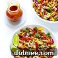 Rainbow Thai Chicken Salad with peanut dressing and fresh ingredients