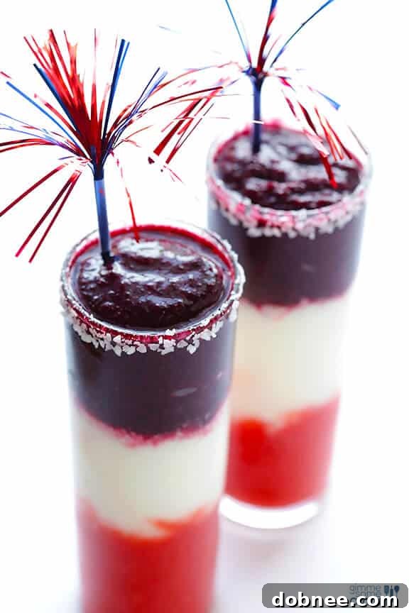 Red White and Blue(berry) Margaritas -- easy to make, and perfect for Memorial Day or the 4th of July! | gimmesomeoven.com #drink #recipe