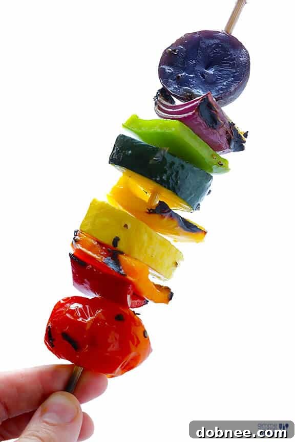 Rainbow Veggie Skewers sizzling on a hot grill