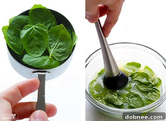 The first step to a perfect Mojito Pie: infusing lime with fresh mint. Muddling fresh mint leaves with lime juice for the Mojito Pie filling.