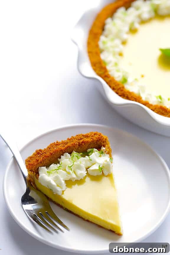 The finished Mojito Pie, a refreshing and irresistible dessert. A beautifully baked and chilled Mojito Pie, ready to be served.