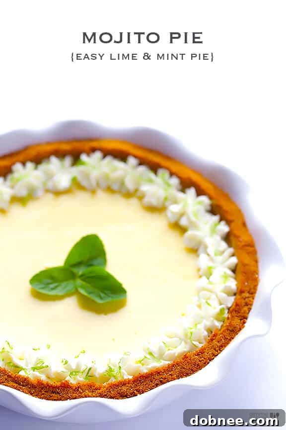 Savor the fresh, vibrant flavors of this homemade Mojito Pie. A close-up of a Mojito Pie slice with fresh mint garnish, ready to be enjoyed.