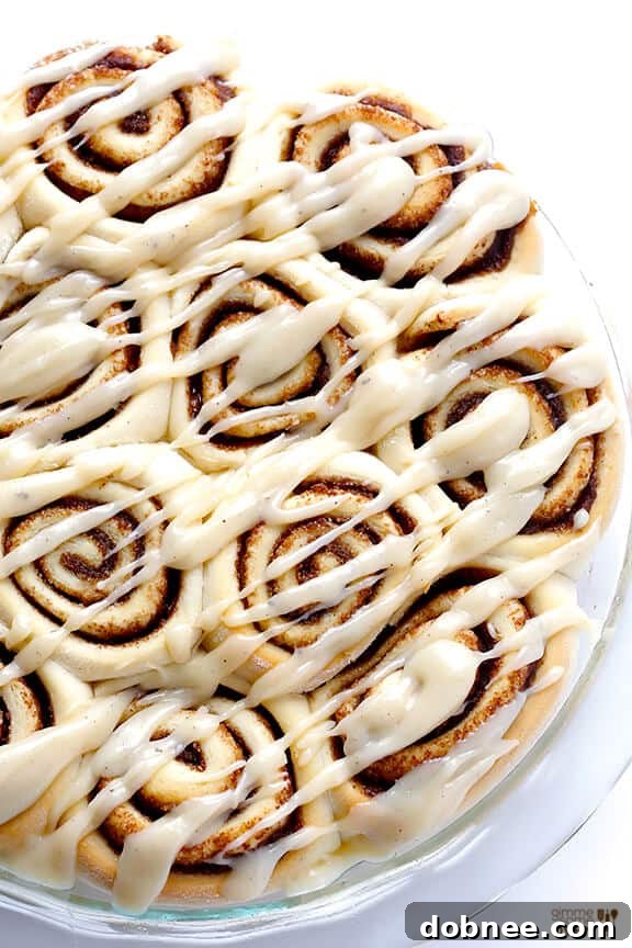 A final close-up of the irresistible brown butter cinnamon rolls, garnished and ready to be devoured.