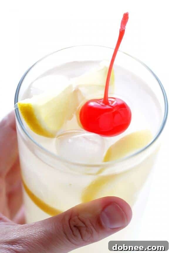 Ginger Tom Collins -- this spiked lemonade is made with a hint of ginger, and is so simple and refreshing! gimmesomeoven.com