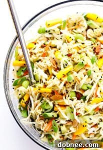 Crunchy Ramen Noodle Salad with fresh mango, avocado, edamame, and a delicious sesame vinaigrette.