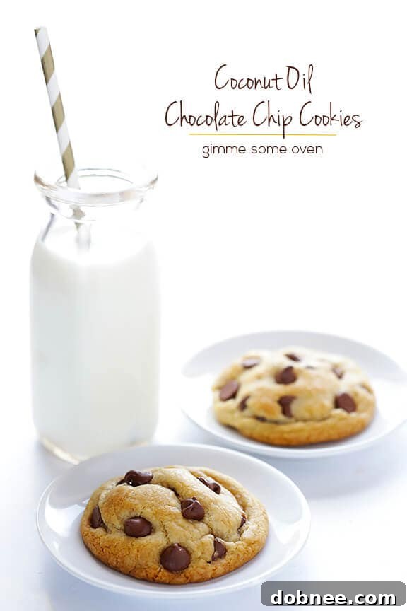 A tantalizing close-up of a coconut oil chocolate chip cookie revealing its soft interior