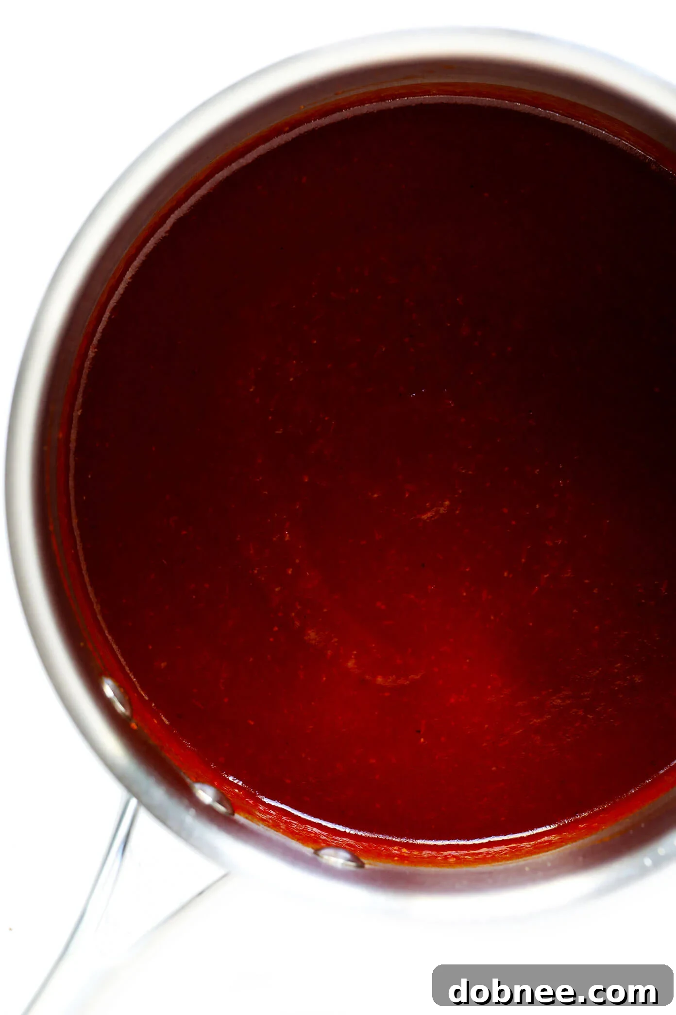 This Kansas City-style homemade BBQ sauce recipe is super quick and easy to make, and full of the best tangy, smoky and slightly-sweet flavors that everyone is sure to love! Add it to chicken, pork, ribs, pizza, salad, tacos or whatever sounds good. | gimmesomeoven.com #bbq #sauce #barbecue #homemade #summer #grilled #chicken #pork #glutenfree #healthy How to Make Authentic Kansas City BBQ Sauce at Home