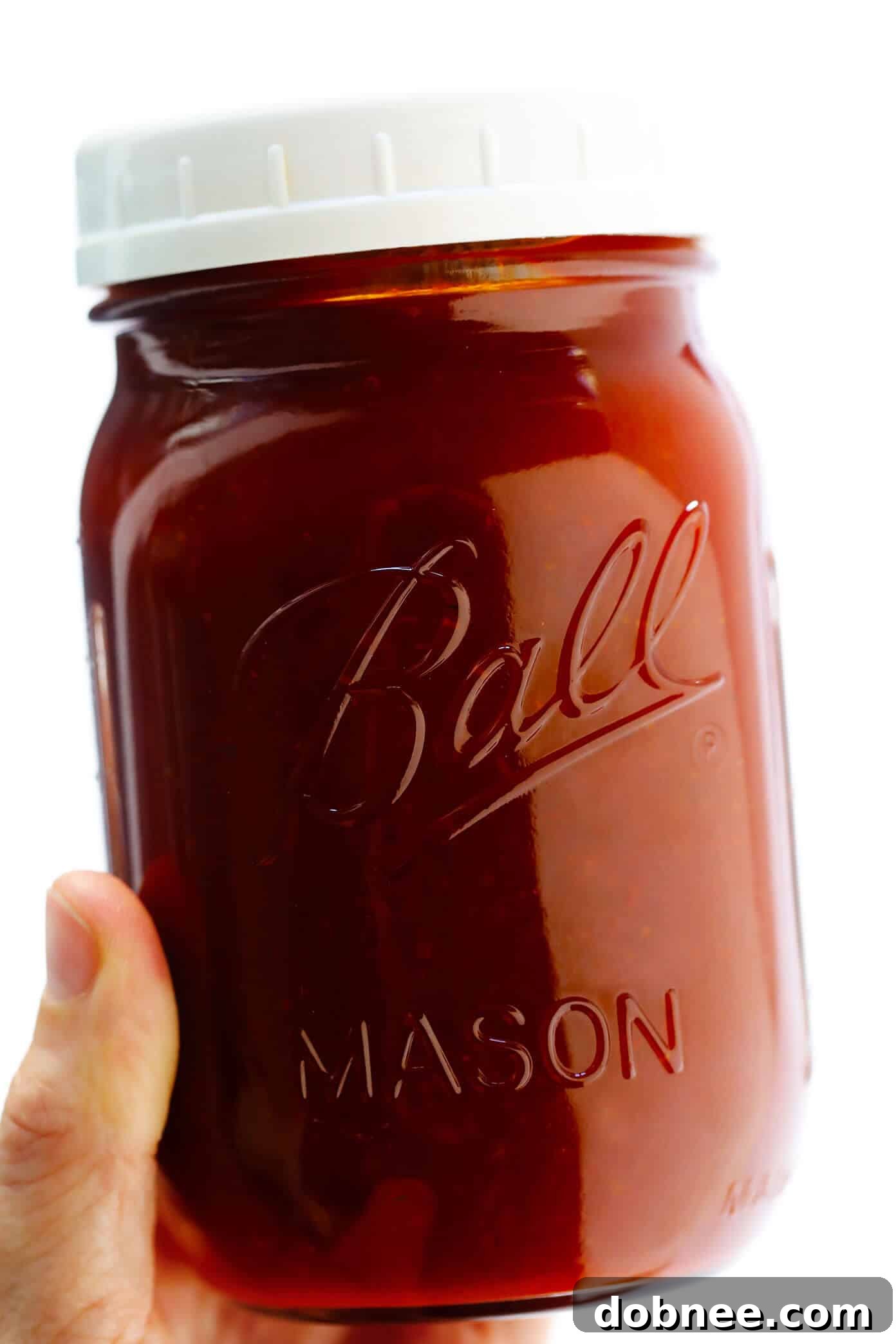 This Kansas City-style homemade BBQ sauce recipe is super quick and easy to make, and full of the best tangy, smoky and slightly-sweet flavors that everyone is sure to love! Add it to chicken, pork, ribs, pizza, salad, tacos or whatever sounds good. | gimmesomeoven.com #bbq #sauce #barbecue #homemade #summer #grilled #chicken #pork #glutenfree #healthy Easy Homemade Kansas City BBQ Sauce for Grilling and More