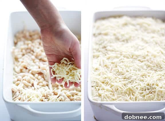Adding shredded chicken and white beans to the casserole