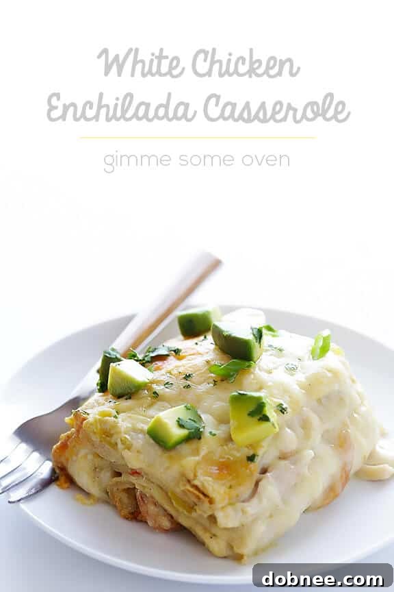 Pan of White Chicken Enchilada Casserole with cilantro garnish