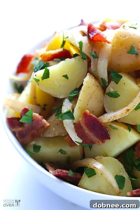 Delicious German Potato Salad with crispy bacon and fresh parsley