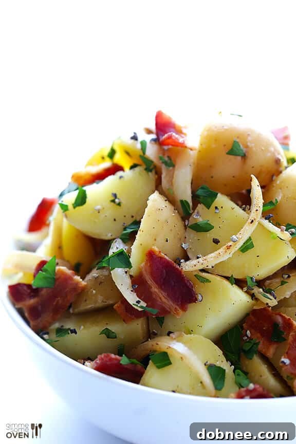 Finished German Potato Salad garnished with fresh parsley