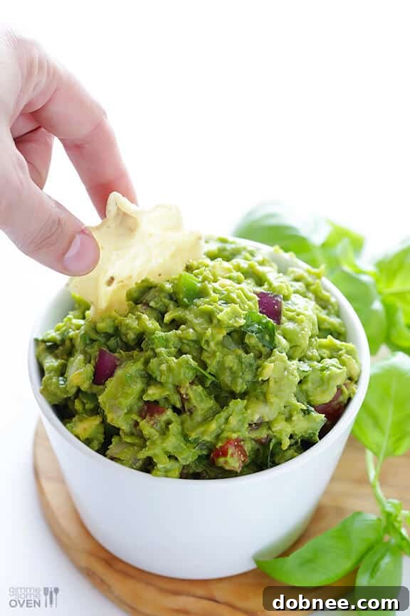 Taking a taste of freshly made Italian Guacamole