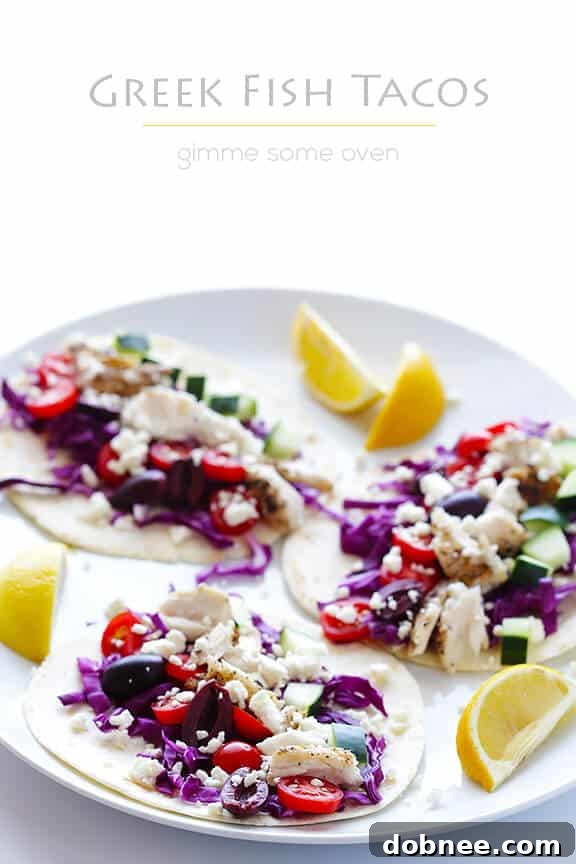Platter of Greek Fish Tacos with fresh toppings.