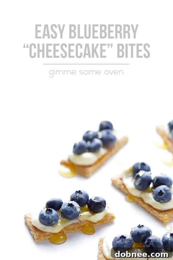 A final shot of the easy blueberry cheesecake bites on a wooden board, ready for a party or snack time.