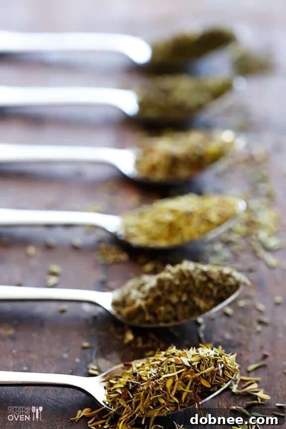 Homemade Italian Seasoning Blend Homemade Italian seasoning in a small jar, showcasing the texture and color of the dried herbs.