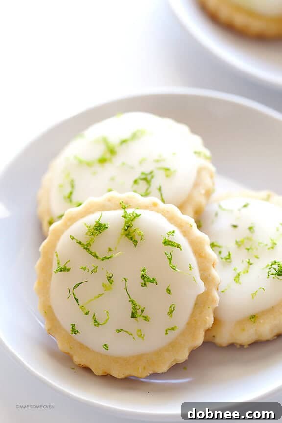 Delicious Coconut Lime Shortbread Cookies, rich in buttery flavor, fresh lime, and coconut, topped with a bright lime glaze. An absolute favorite cookie recipe for any occasion.