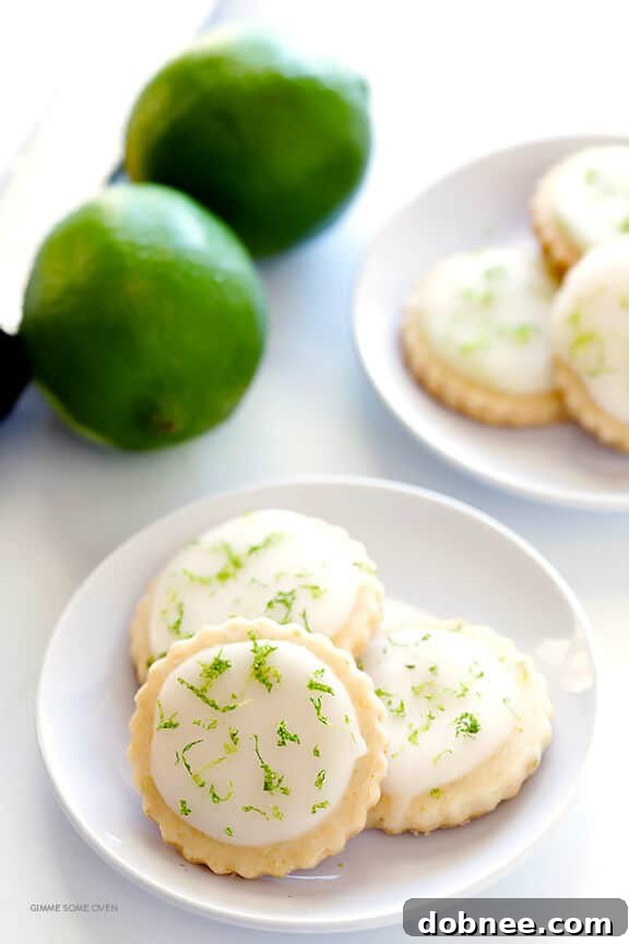 Close-up of baked Coconut Lime Shortbread Cookies, ready for glazing, showcasing their golden edges and delicate texture.
