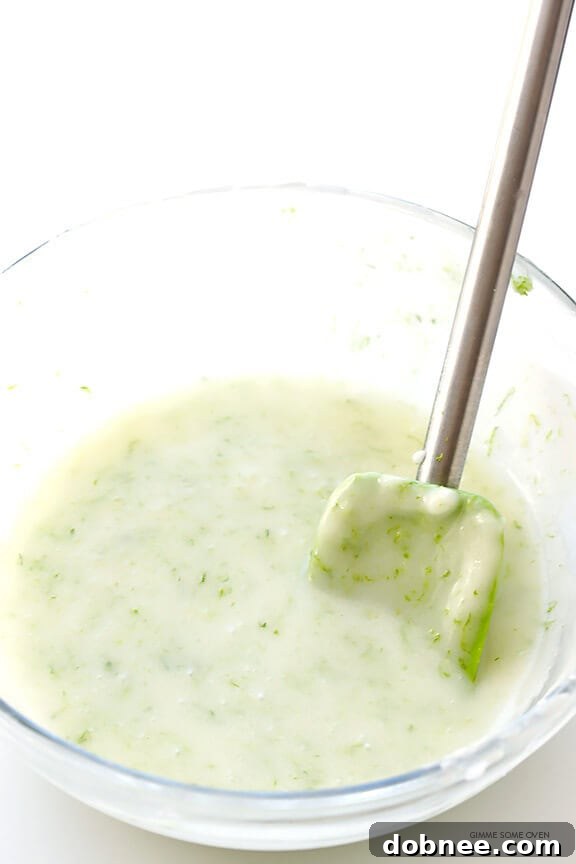 Freshly grated lime zest, an essential ingredient for infusing vibrant citrus flavor into Coconut Lime Shortbread Cookies.