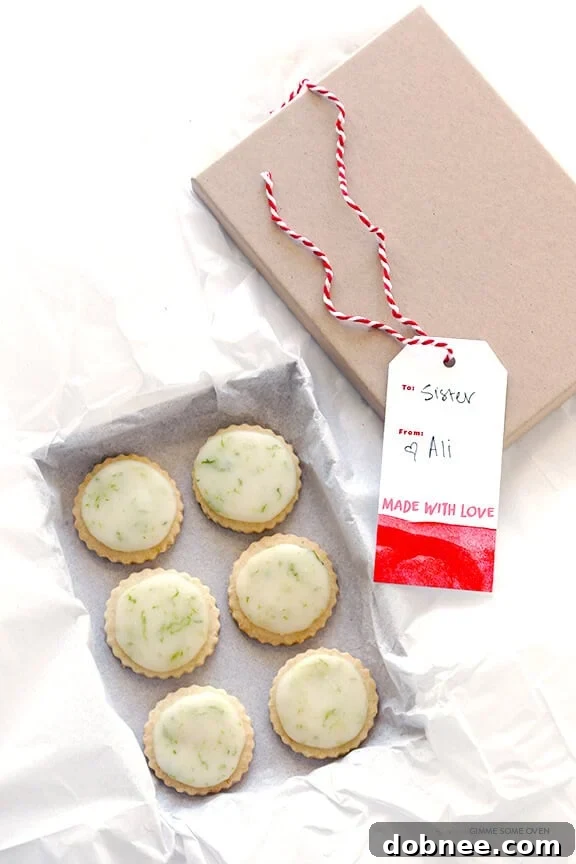 Beautifully arranged Coconut Lime Shortbread Cookies with vibrant lime glaze and zest, perfect for gifting or sharing.