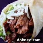 Slow Cooker Shredded Beef Tacos with fresh toppings