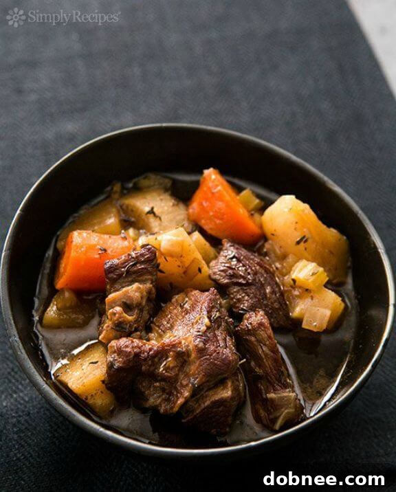Rich Slow Cooker Guinness Stew with tender beef and vegetables
