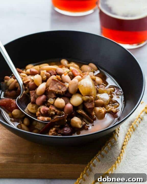 Homestyle Slow Cooker Ham and Bean Soup with fresh herbs