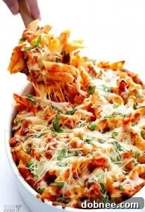 Chicken Parmesan Baked Ziti with golden melted cheese on top.