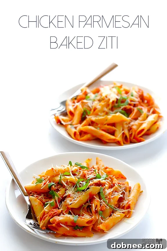 Close-up of the delicious Chicken Parmesan Baked Ziti with herbs.